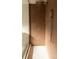 Modern shower featuring brown tiling, glass enclosure, and stylish gold fixtures at 4631 Zuni St, Denver, CO 80211