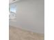 A simple bedroom with neutral carpeting, one window, and neutral paint at 933 Canal West Dr, Brighton, CO 80603