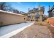 Spacious backyard with detached garage and deck, ideal for entertaining and outdoor activities at 1368 N Gilpin St, Denver, CO 80218