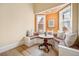 Cozy breakfast nook with window seating and a charming table at 1368 N Gilpin St, Denver, CO 80218