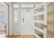 Bright foyer features leaded glass, white mosaic tile, and refinished hardwood floors at 1368 N Gilpin St, Denver, CO 80218