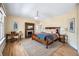 Bright and airy main bedroom with a fireplace, desk, and natural light at 1368 N Gilpin St, Denver, CO 80218