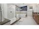 Modern bathroom with a glass-enclosed shower and luxurious soaking tub at 16371 Jones Mountain Way, Broomfield, CO 80023