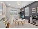 A charming playroom with a teepee, play kitchen, shelves and a window with natural light at 16371 Jones Mountain Way, Broomfield, CO 80023