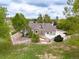 An aerial view of the home showcasing the well-maintained yard, landscaping, and privacy fence at 3784 Whitetail Ct, Mead, CO 80542