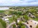 Aerial view of property with large lot and pond nearby at 3784 Whitetail Ct, Mead, CO 80542