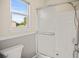 Basement bathroom with shower/tub and window at 3784 Whitetail Ct, Mead, CO 80542