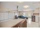 View of the spacious garage with epoxy flooring and overhead lighting at 3784 Whitetail Ct, Mead, CO 80542