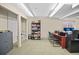 Another view of the well-lit office space, featuring a storage cabinet at 3784 Whitetail Ct, Mead, CO 80542