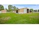 Outbuilding featuring partial open bay and overhead door at 3784 Whitetail Ct, Mead, CO 80542