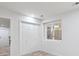 Bedroom featuring a window and closet with white doors at 7309 Windsor Dr, Boulder, CO 80301