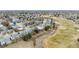 Vast aerial shot showcasing homes near a golf course in a residential community at 664 Clarendon Dr, Longmont, CO 80504