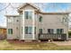 Spacious backyard features a well-maintained deck perfect for relaxing and entertaining outdoors at 664 Clarendon Dr, Longmont, CO 80504