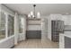 Open-concept kitchen features stainless steel appliances, custom cabinets, and granite countertops at 664 Clarendon Dr, Longmont, CO 80504