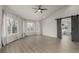 Spacious main bedroom with lots of natural light, vaulted ceiling, and barn door to bathroom at 664 Clarendon Dr, Longmont, CO 80504