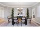 Dining room featuring a modern chandelier, a table with chairs, and elegant décor at 22419 Springflower Dr, Golden, CO 80401