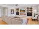 Cozy living room features a fireplace and entertainment center with built-in shelves at 22419 Springflower Dr, Golden, CO 80401