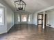 Spacious living room featuring hardwood floors and a bay window at 17548 E Wesley Pl, Aurora, CO 80013