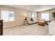 Bright bonus room with large windows, comfortable seating, and stylish decor at 350 Vista Cliff Cir, Castle Rock, CO 80104