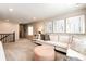 Cozy upstairs living room with plush carpet and elegant decor, perfect for relaxation and entertaining at 350 Vista Cliff Cir, Castle Rock, CO 80104