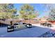 Staged backyard featuring outdoor furniture with a fire pit, perfect for outdoor activities at 1109 E 7Th Avenue Cir, Broomfield, CO 80020