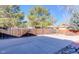 Spacious backyard featuring a wooden fence and concrete patio, perfect for outdoor activities at 1109 E 7Th Avenue Cir, Broomfield, CO 80020