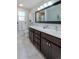 Modern bathroom with a double sink vanity, updated fixtures, and stylish accents at 1109 E 7Th Avenue Cir, Broomfield, CO 80020