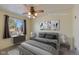 Virtually staged bright bedroom featuring neutral carpet, furnishings, and decor at 1109 E 7Th Avenue Cir, Broomfield, CO 80020