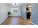 Dining area with hardwood floors, a window overlooking the outdoors, and access to the kitchen at 1109 E 7Th Avenue Cir, Broomfield, CO 80020