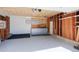 Spacious garage with built-in storage shelves and a workbench for all your projects at 1109 E 7Th Avenue Cir, Broomfield, CO 80020