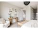 Bright and airy main bedroom featuring contemporary furnishings and decor at 6068 Beeler Ct, Denver, CO 80238