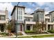 Modern home featuring large windows, clean lines, and low maintenance landscaping at 6068 Beeler Ct, Denver, CO 80238