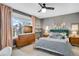 Cozy bedroom with a queen-size bed and stylish accents at 11765 Perry St, Westminster, CO 80031