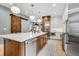 Open kitchen featuring a large island and stainless steel appliances at 11765 Perry St, Westminster, CO 80031