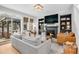 Cozy living room with fireplace and built-in shelving at 11765 Perry St, Westminster, CO 80031