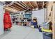 Basement storage with organized shelving units filled with various containers and neatly stored items at 15747 Willow Way, Thornton, CO 80602