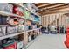 Basement storage with metal shelving units full of containers and neatly stored items ready for organizing at 15747 Willow Way, Thornton, CO 80602