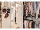 Organized closet with abundant shelving and hanging space for clothes and shoes at 15747 Willow Way, Thornton, CO 80602