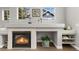 Close up of fireplace featuring tiled surround, hearth, and mantle at 12935 Lafayette St # B, Thornton, CO 80241