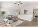 Inviting living area with hardwood floors, vaulted ceiling, and neutral tones at 12935 Lafayette St # B, Thornton, CO 80241
