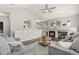 Spacious living room boasts a fireplace, vaulted ceilings, and an open layout at 12935 Lafayette St # B, Thornton, CO 80241