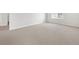 Large bedroom with neutral carpet, a window, and plenty of space for relaxing at 1965 S Coolidge Way, Aurora, CO 80018