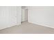 Clean bedroom with carpet and white closet, ready for your personal touch at 1965 S Coolidge Way, Aurora, CO 80018