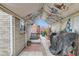 View of a patio structure with a grill and outdoor access at 4933 Altura St, Denver, CO 80239