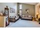 Well-decorated living area with plush sofas, decorative mirror, and high ceilings for a spacious feel at 4933 Altura St, Denver, CO 80239