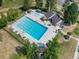 A pristine community pool, surrounded by lounge chairs, is the perfect place to relax and unwind at 7426 S Hudson Way, Centennial, CO 80122