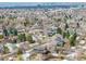 Expansive aerial shot of a residential neighborhood, highlighting proximity to the city at 3350 S Eudora St, Denver, CO 80222