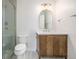 Modern bathroom with decorative fixtures, patterned tile floor, and glass shower at 3350 S Eudora St, Denver, CO 80222