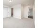 Neutral bedroom with two large closets, carpet, and neutral colors at 3350 S Eudora St, Denver, CO 80222
