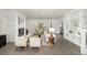 Spacious living room with a fireplace, modern furniture, hardwood floors and a lot of light at 3350 S Eudora St, Denver, CO 80222